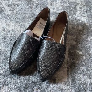 A new day.  Snake print flats
